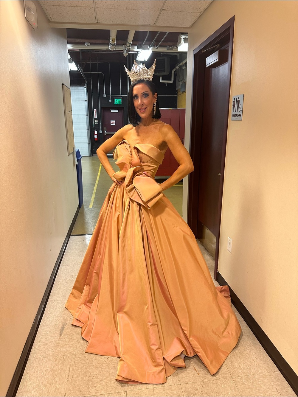 Strapless Peach Evening Gown with Sculpted Bow Detail
